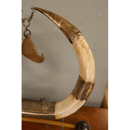 284 - Boar tusk and white metal table gong