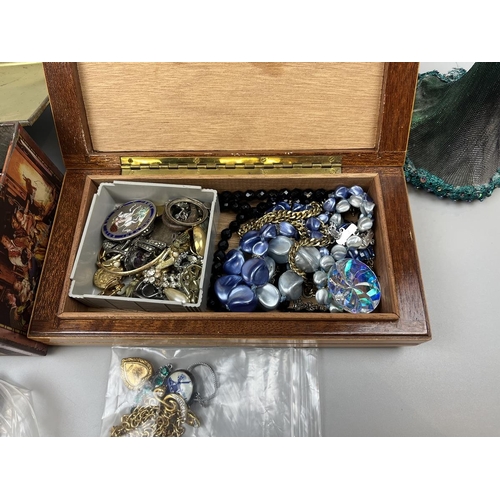 65 - Collection of costume jewellery to include jewellery stand