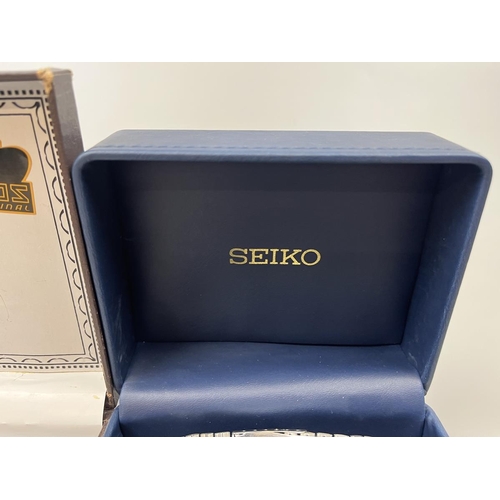 68 - Gents Seiko watch together with Qbos watch pen and knife set