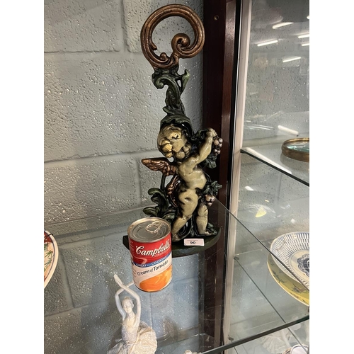 90 - Cast iron cherub door stop