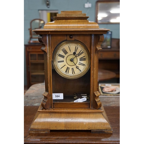 384 - Wooden cased clock