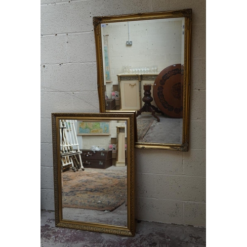 411 - 2 large bevelled glass gilt framed mirrors