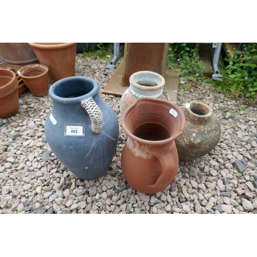 462 - 2 small terracotta jugs together with 2 small urns