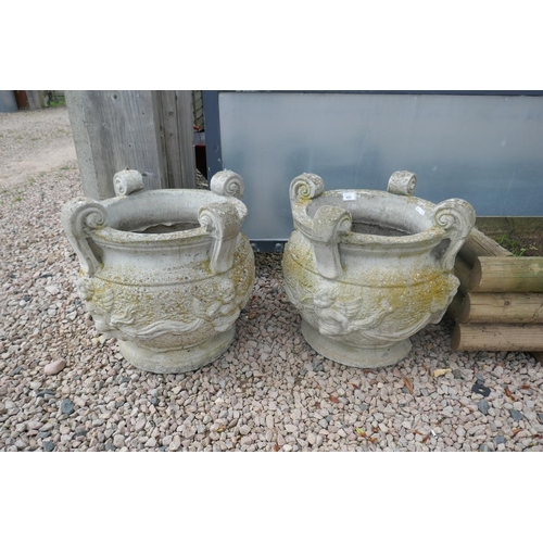 469 - Pair of large heavy stone planters adorned with cherubs - Approx height: 50cm