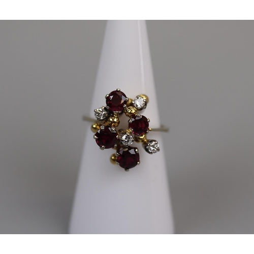 61 - 18ct gold ruby & diamond set ring - Size: L