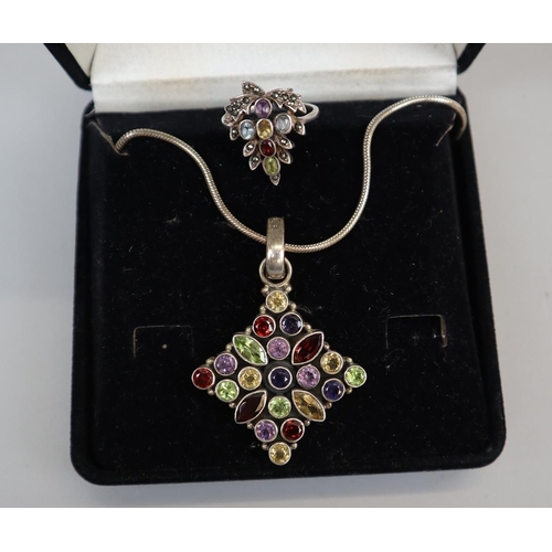 75 - Multi-stone silver pendant on chain together with multi-stone silver ring