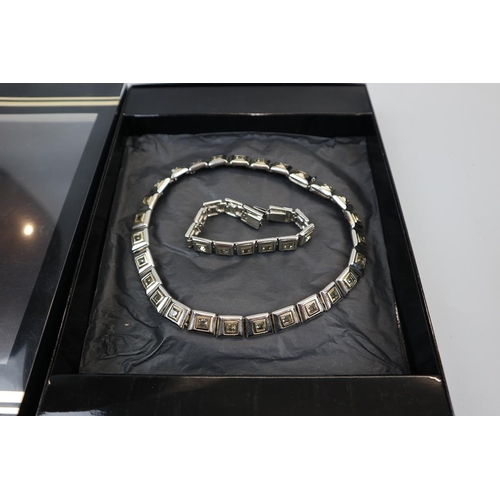 80 - Yves Saint Laurent collection necklace & bracelet set