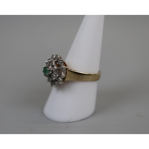 27 - 9ct gold emerald and diamond cluster ring - Size: P