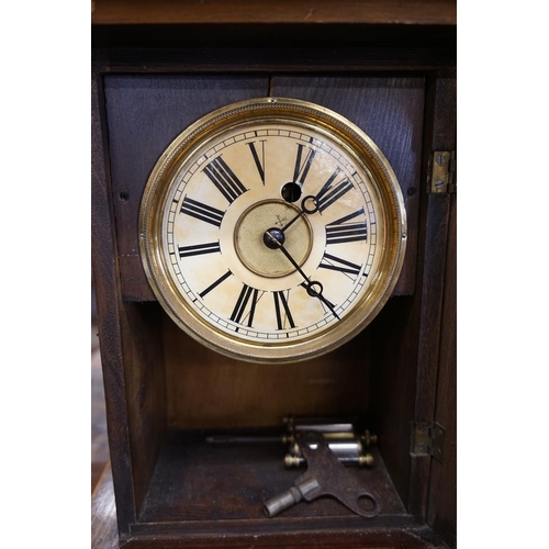 384 - Wooden cased clock