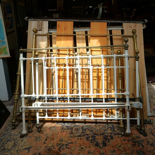 413 - 2 brass framed and painted framed Victorian beds with bases