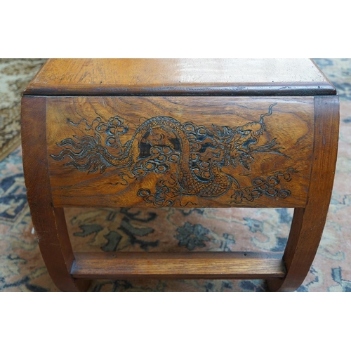 434 - Oriental coffee table carved with dragons to the top and sides