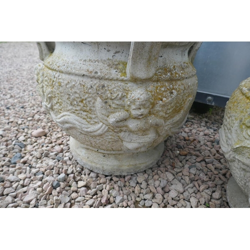 469 - Pair of large heavy stone planters adorned with cherubs - Approx height: 50cm