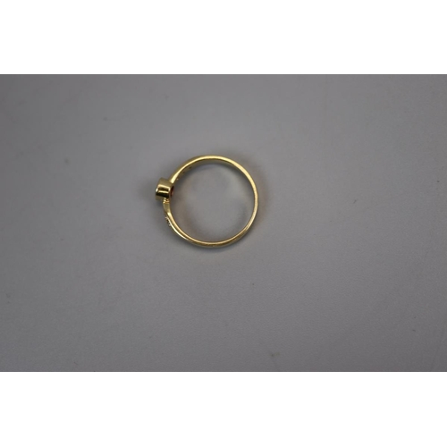 58 - 18ct gold ruby & diamond set ring - Size: P
