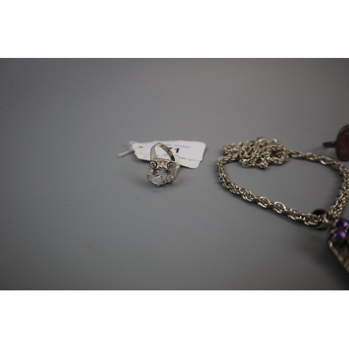 71 - Amethyst set silver crucifix on silver chain together with 2 silver rings