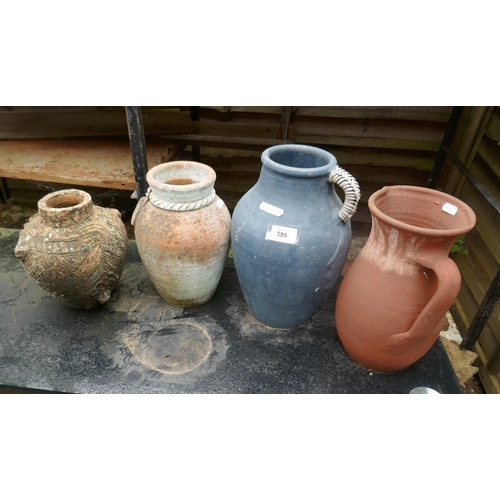 395 - 2 small terracotta jugs together with 2 small urns