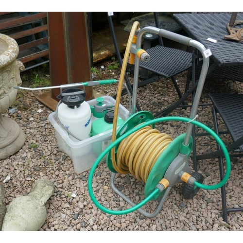 399 - Hozelock hose cart with hose and spray nozzle together with 2 further nozzles and 5ltr ready to use ... 