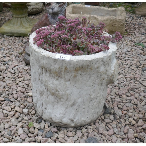 412 - Stone log planter with plants