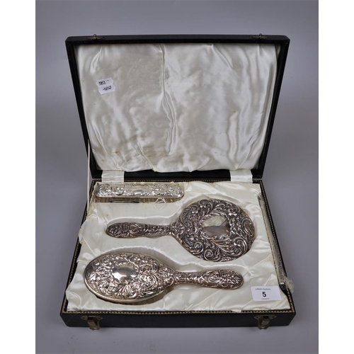 5 - Hallmarked silver cased dressing table set