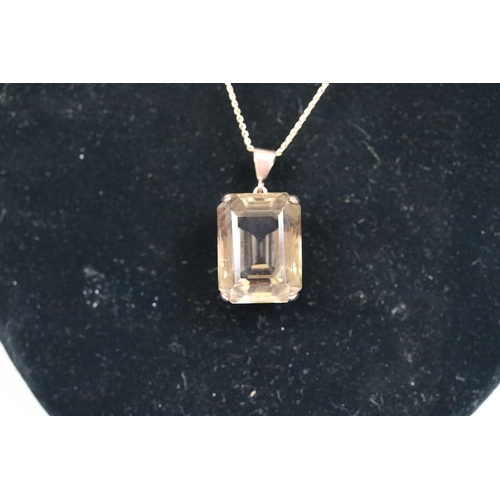 26 - 9ct gold necklace with topaz set pendant 