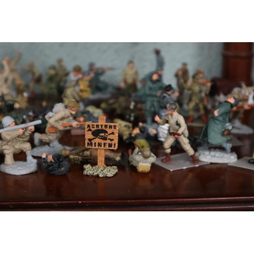 140 - Collection of military figurines etc.