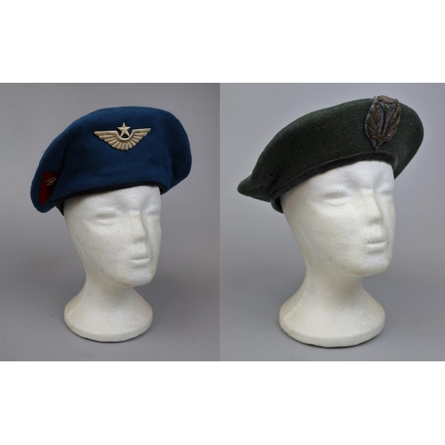 143 - Russian Paratroopers beret with badges together with an Italian Paratroopers beret with badges