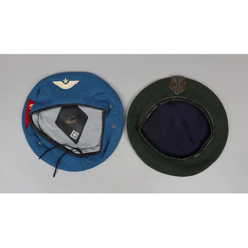 143 - Russian Paratroopers beret with badges together with an Italian Paratroopers beret with badges