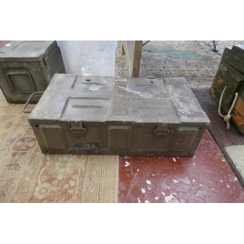 179 - 2 ammo boxes together with a shell case
