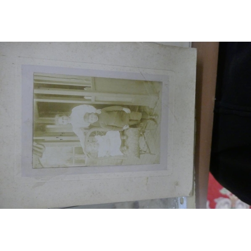 197 - Photo of gentleman in uniform together with family photographs