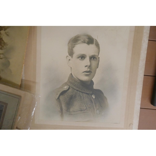 197 - Photo of gentleman in uniform together with family photographs