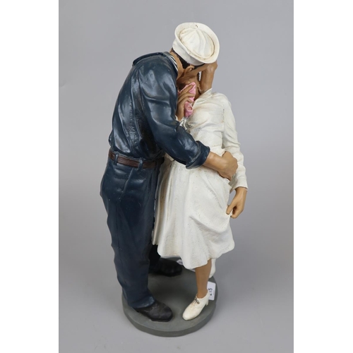 215 - Figurine based on V-J Day in Times Square as photographed by Alfred Eisenstaedt that portrays a U.S.... 