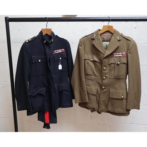 217 - 2 uniforms together with a tin trunk belonging to Major J.W Pogmore which includes 2 citations signe... 