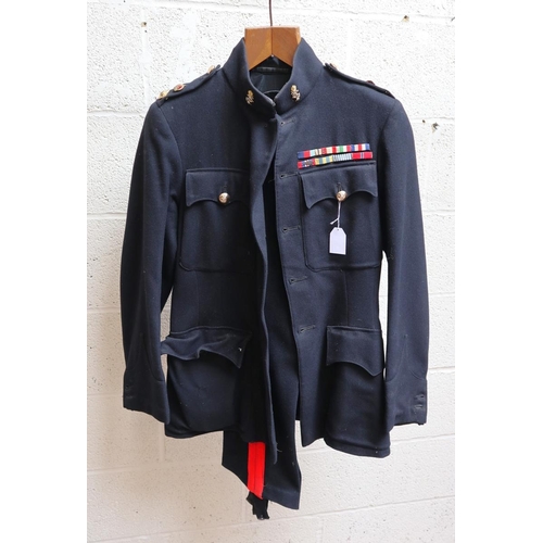 217 - 2 uniforms together with a tin trunk belonging to Major J.W Pogmore which includes 2 citations signe... 