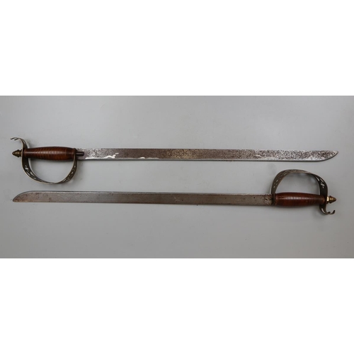 241 - Pair of cutlasses