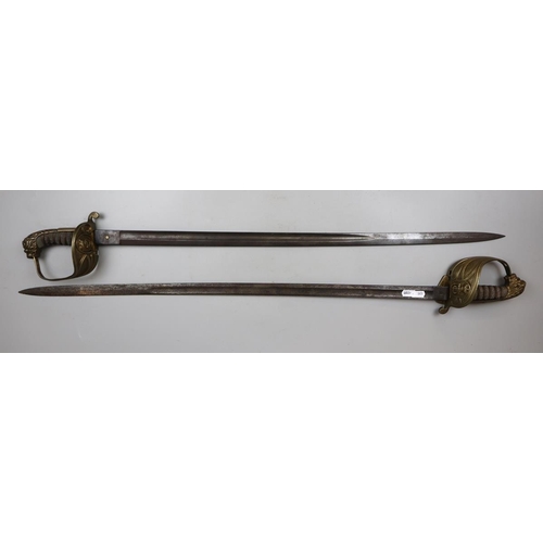 242 - Pair of 1827 lions head naval officers swords