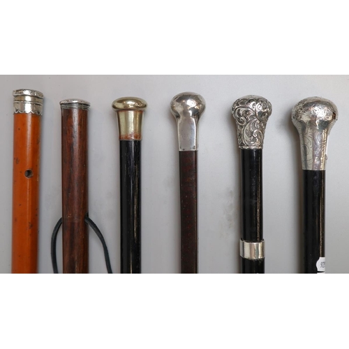 246 - Collection of 6 swagger sticks with hallmarked silver and white metal pommel