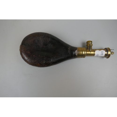 305 - Powder flask in embossed leather marked Dixon and Sons