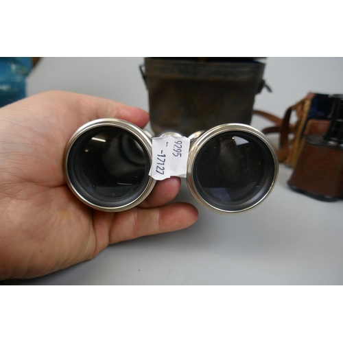 308 - Pair of field glasses in original case together with another marked Chevalier Paris