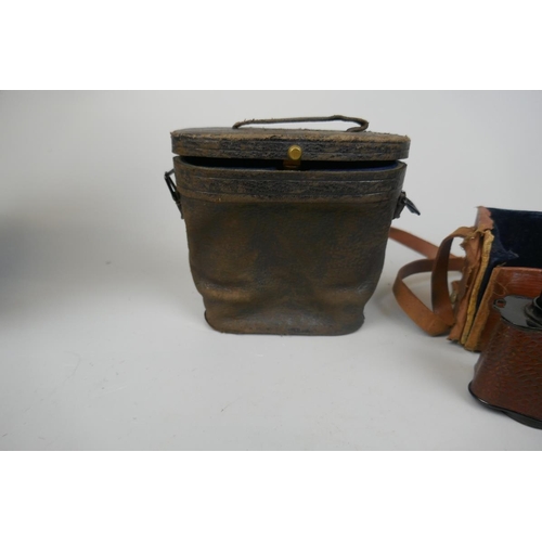 308 - Pair of field glasses in original case together with another marked Chevalier Paris