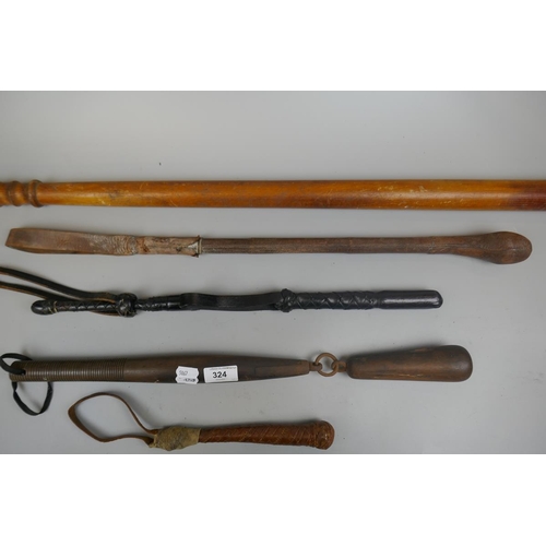 324 - Collection of clubs and coshes