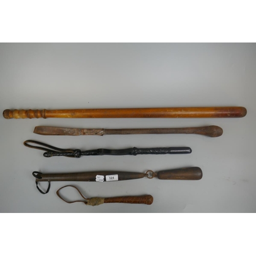 324 - Collection of clubs and coshes