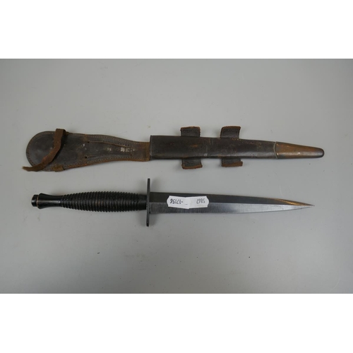 331 - Fairbairn Sykes commando knife in scabbard