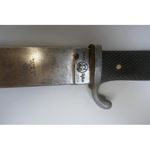 336 - 1942 Hitler Youth dagger in sheath by Solingen and Co.