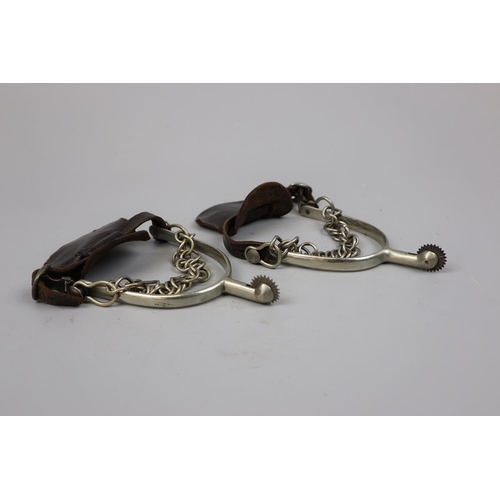 68 - WW1 Spurs with safety chain fasteners