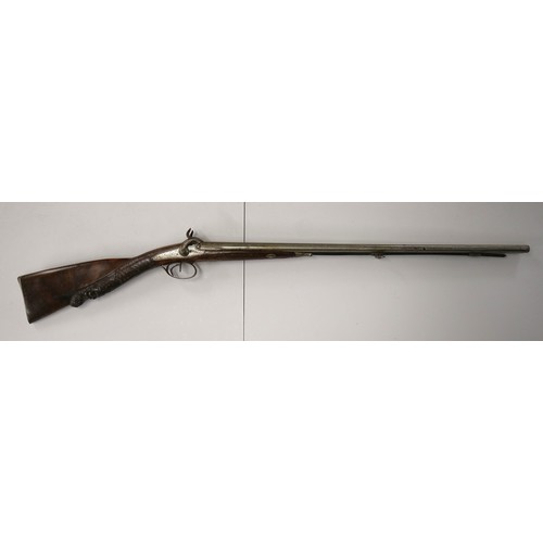 228 - Double barrel flint lock rifle with carved stock