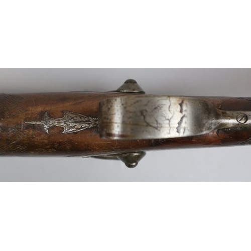 228 - Double barrel flint lock rifle with carved stock