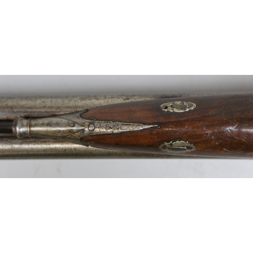 228 - Double barrel flint lock rifle with carved stock