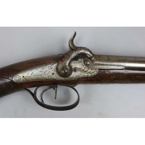 228 - Double barrel flint lock rifle with carved stock