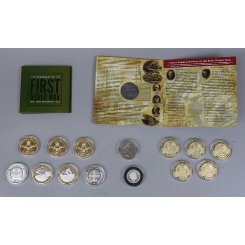 254 - Collection of military themed commemorative coins