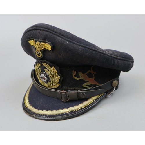 157 - Genuine U-boat Commander's cap with running devil insignia