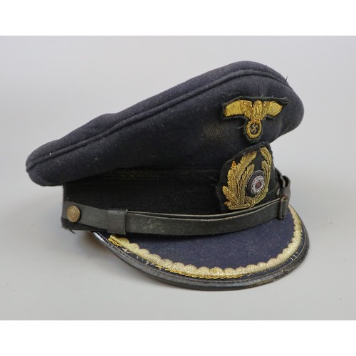 157 - Genuine U-boat Commander's cap with running devil insignia